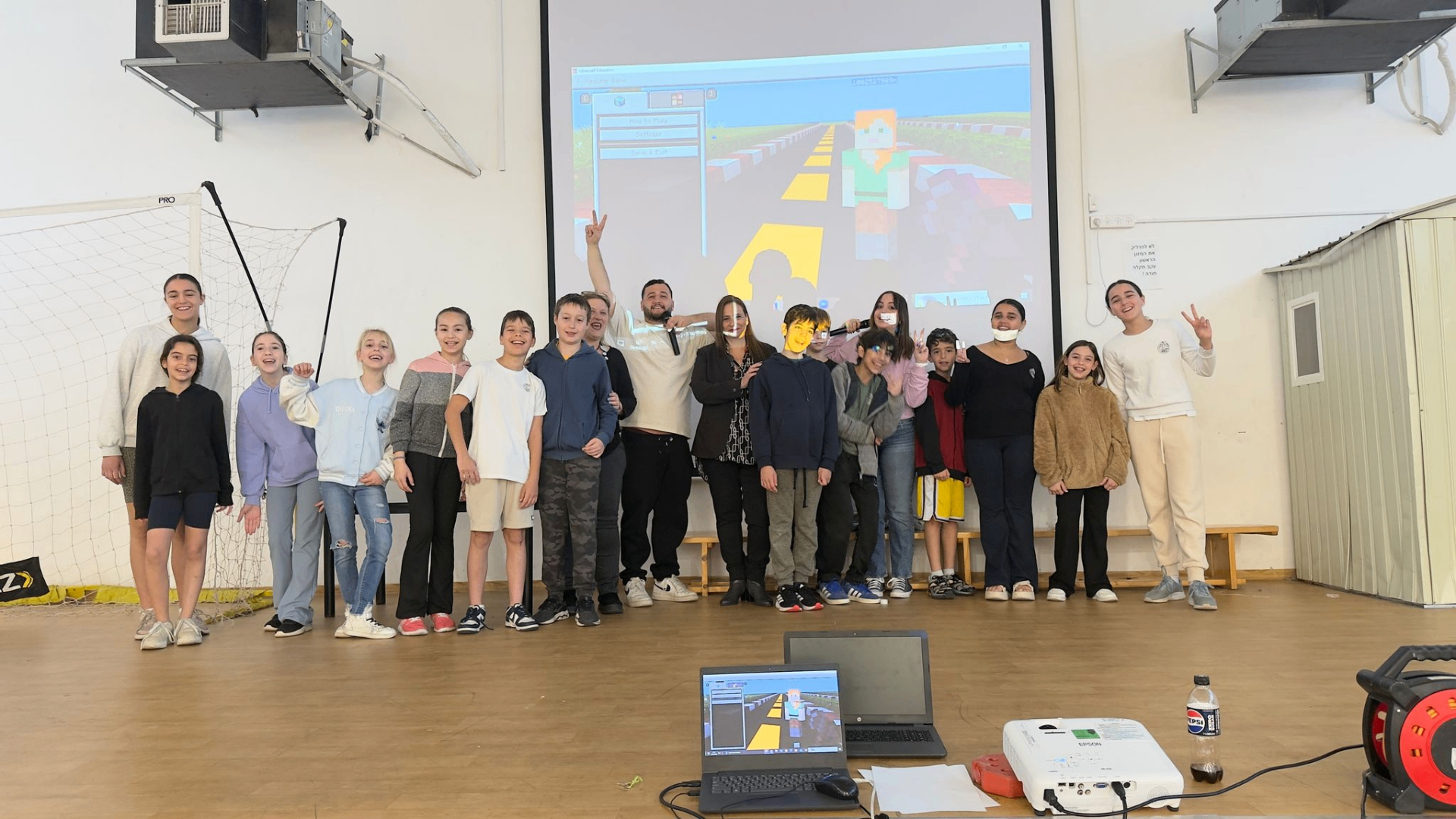Students with teacher and Minecraft project